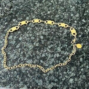 elizabeth 11 dei gratia regina f.d belt metallic 
coin​​​
